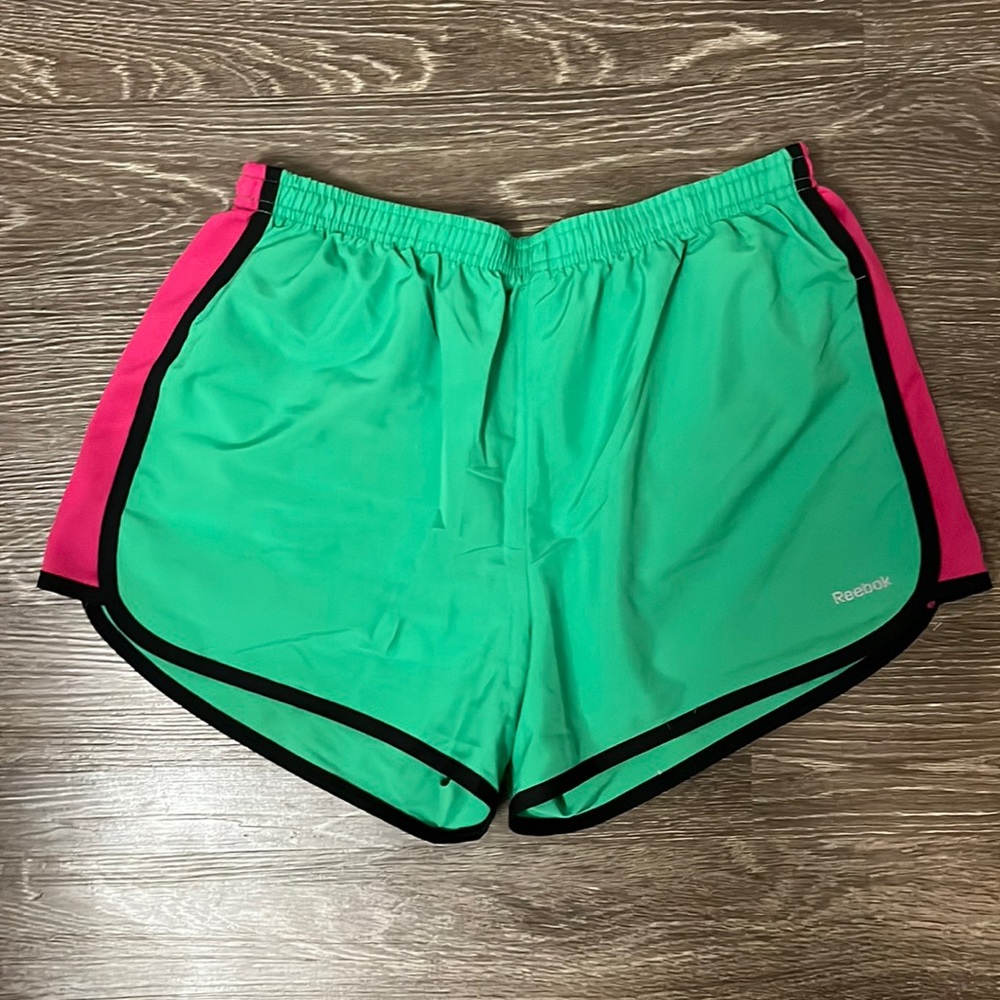 Reebok Play Dry green pink and black running shorts, size M